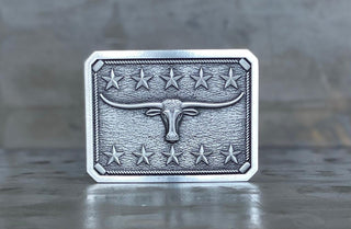 Custom long horn design belt buckle with detailed engraving and star accents by Buckingham Pewter
