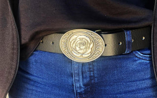 Buckingham Pewter rose belt buckle with intricate floral design on a black leather belt