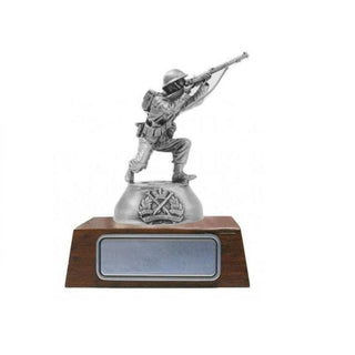Dunkirk WWII pewter figurine of a soldier on a wooden base, handcrafted by Buckingham Pewter